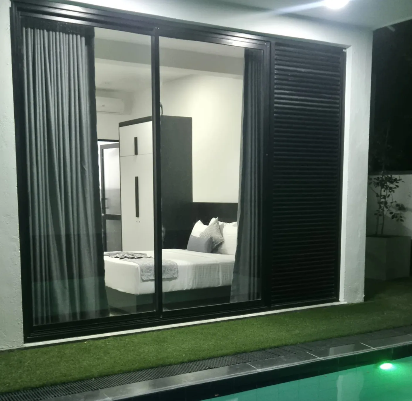 Contemporary garden suite with modern furnishings at TenTwo private villa Kandy Sri Lanka